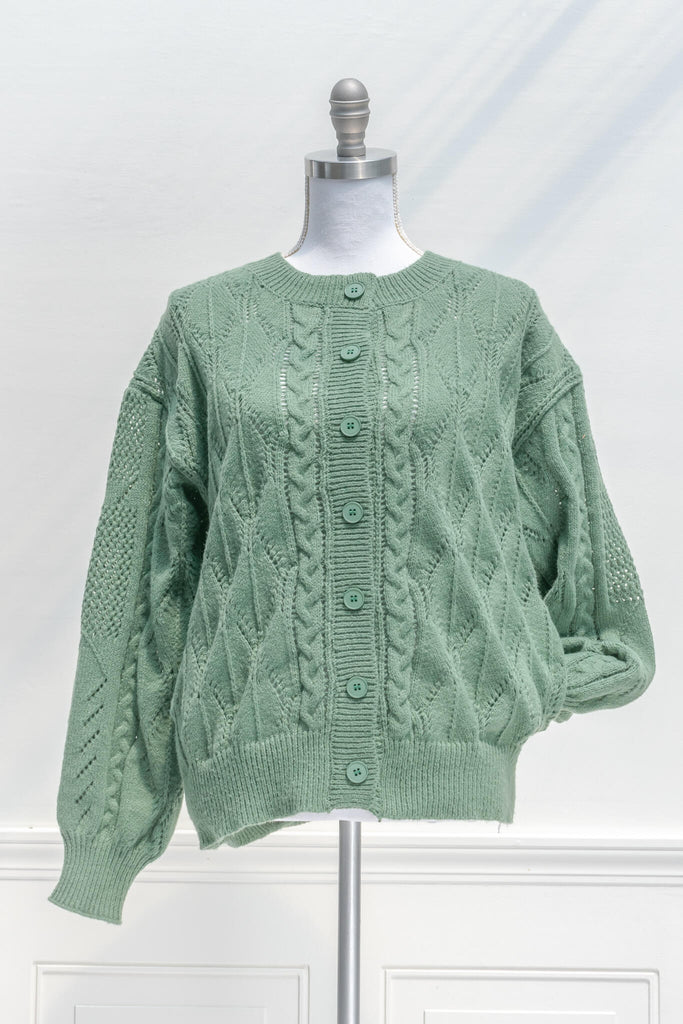 feminine sweaters - a cottagecore and vintage style green cardigan feminine sweater for autumn - fall fashion from amantine - front view 