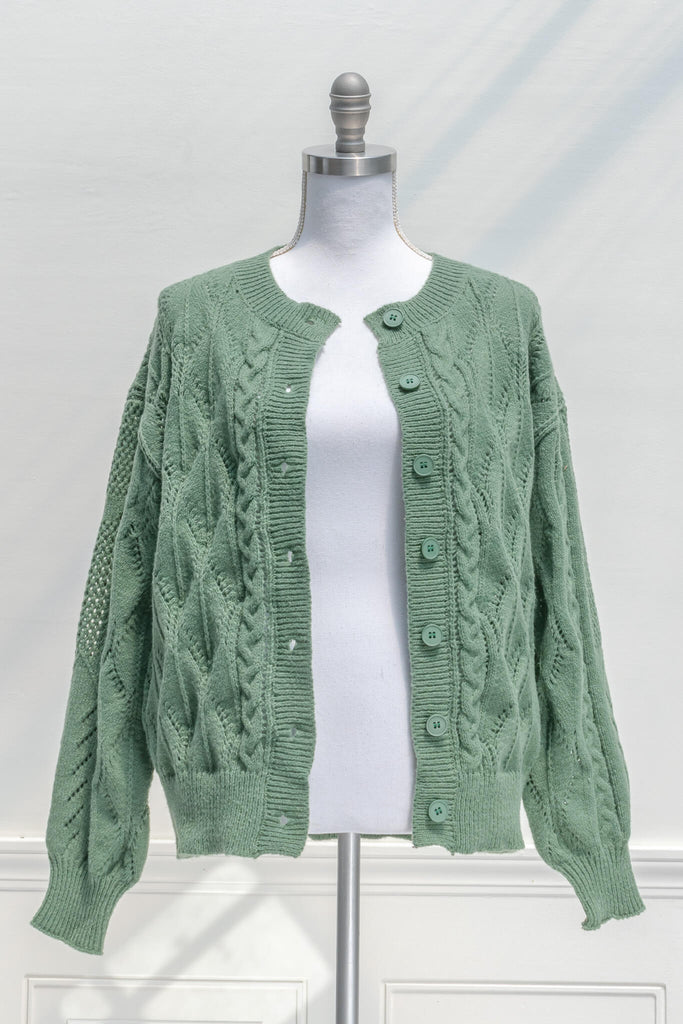 feminine sweaters - a cottagecore and vintage style green cardigan feminine sweater for autumn - fall fashion from amantine - front view 