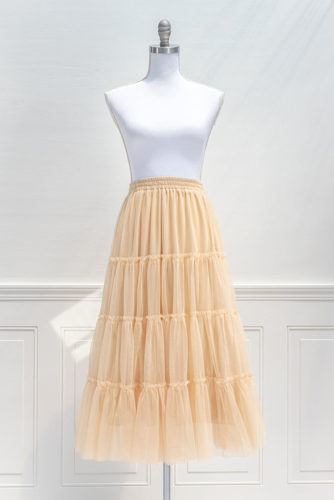 feminine skirts - a cream, tulle, tiered, elastic waist skirt - feminine and french style - front view