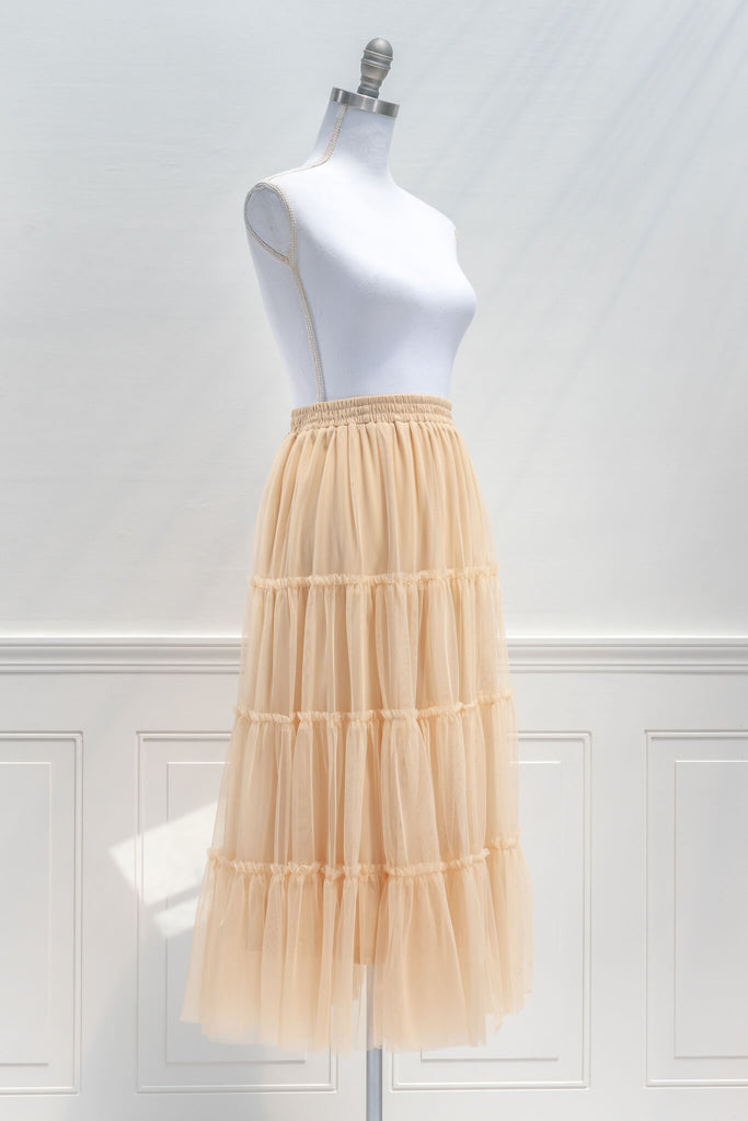 feminine skirts - a cream, tulle, tiered, elastic waist skirt - feminine and french style - quarter view