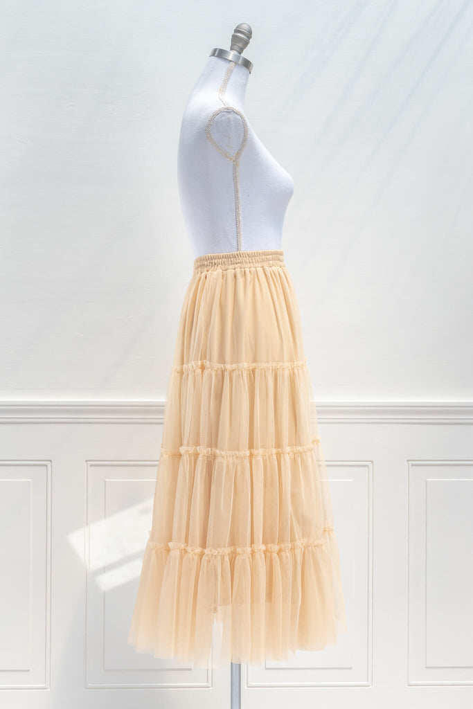 feminine skirts - a cream, tulle, tiered, elastic waist skirt - feminine and french style - side view
