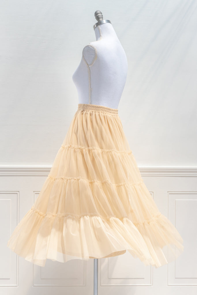 feminine skirts - a cream, tulle, tiered, elastic waist skirt - feminine and french style - back side view