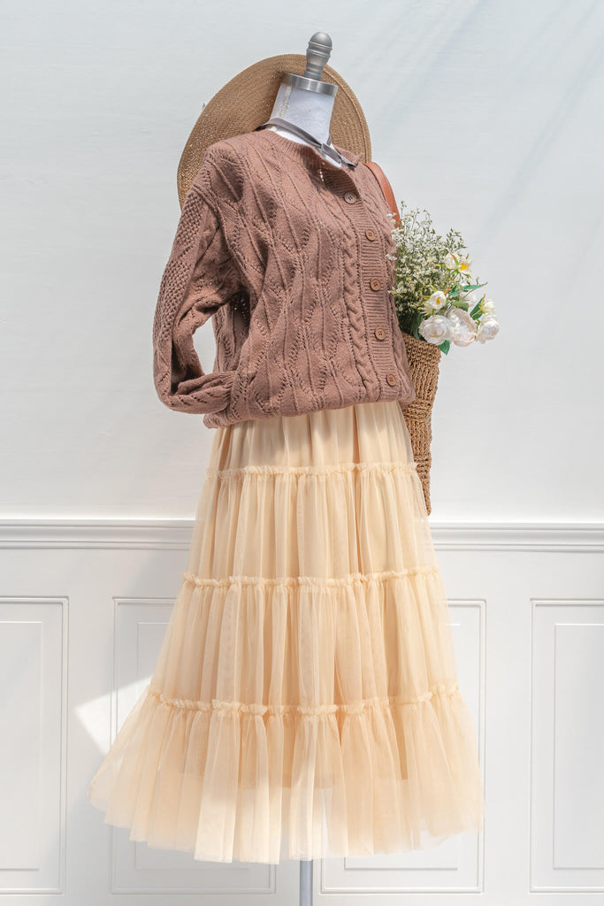 feminine skirts - a cream, tulle, tiered, elastic waist skirt - feminine and french style - styled with a brown cardigan view