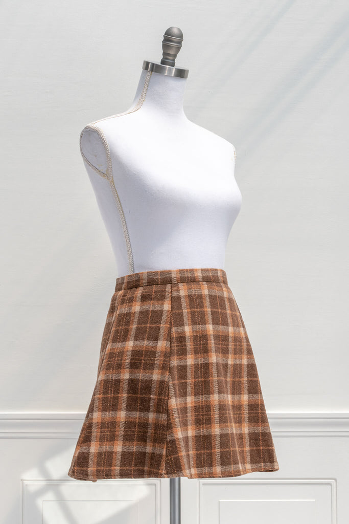 Aesthetic Clothes / a vintage cute school style brown and orange plaid mini skirt - quarter view