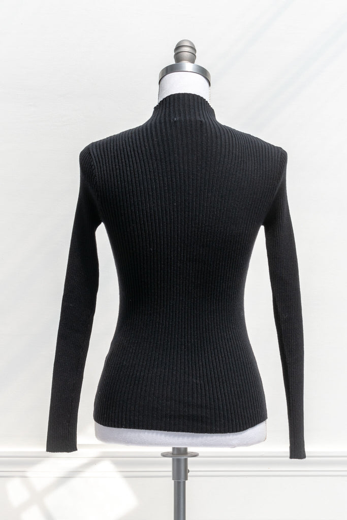 feminine clothing - a french girl style black knit long sleeve ribbed sweater - amantine - back view