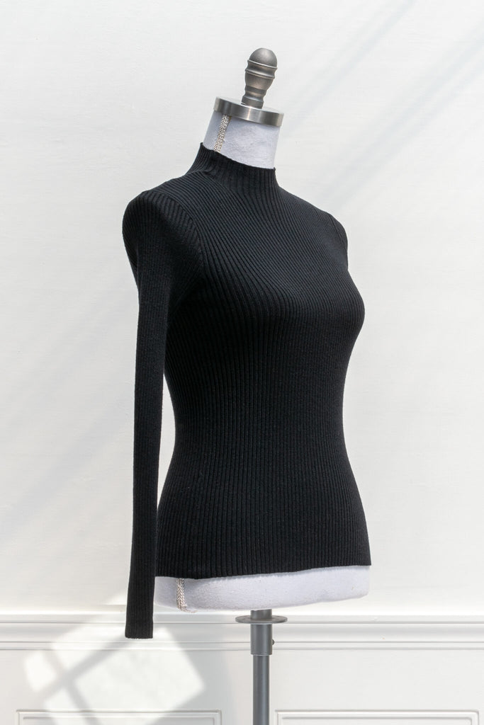 feminine clothing - a french girl style black knit long sleeve ribbed sweater - amantine - quarter view