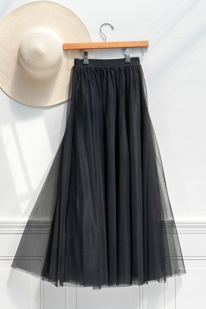 feminine aesthetic clothing - a long maxi skirt in black color and tulle fabric - french girl autumn style - amantine - on hanger view