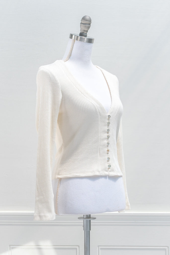 feminine style clothing - ribbed knit white button down shirt with deep v neck.