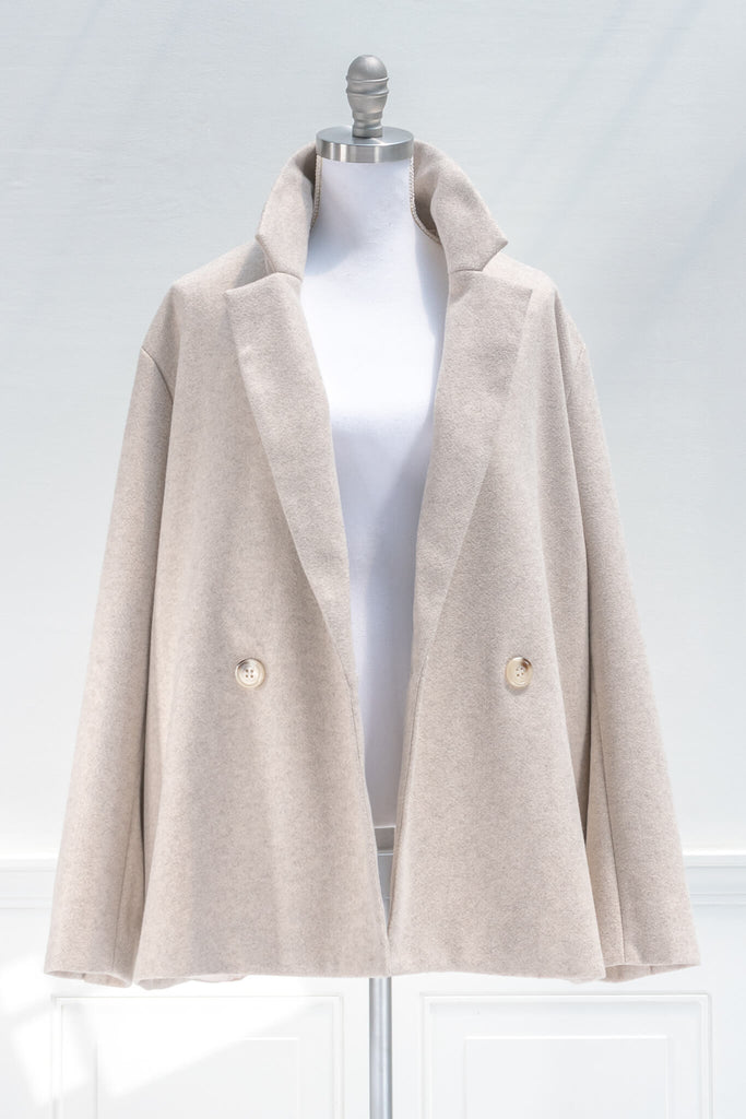 french winter coat style - a soft taupe boyfriend cut winter jacquet - front view open buttons