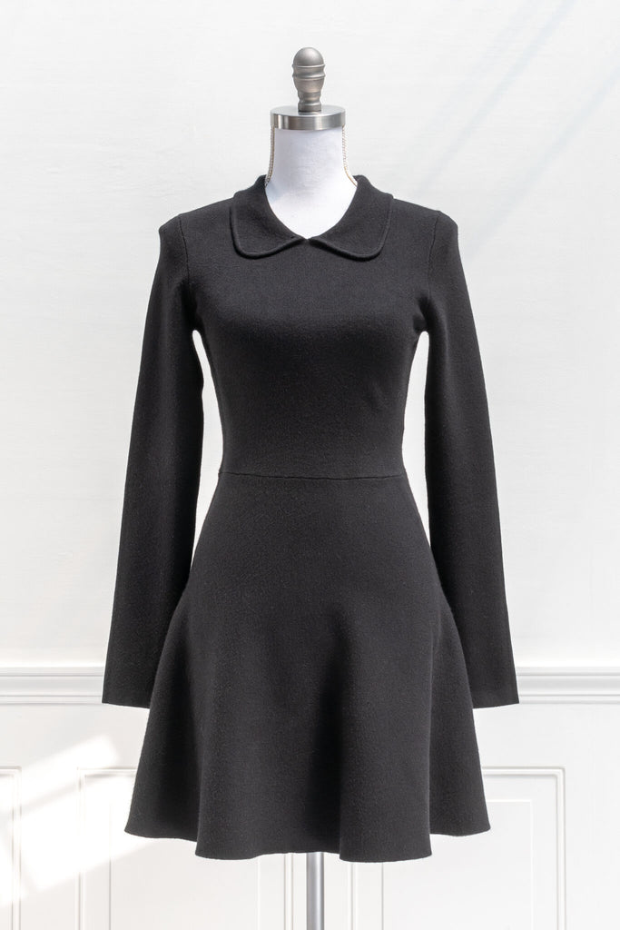 french dress and retro fashion - a french girl style dress in black knit and long sleeves - amantine - front view 
