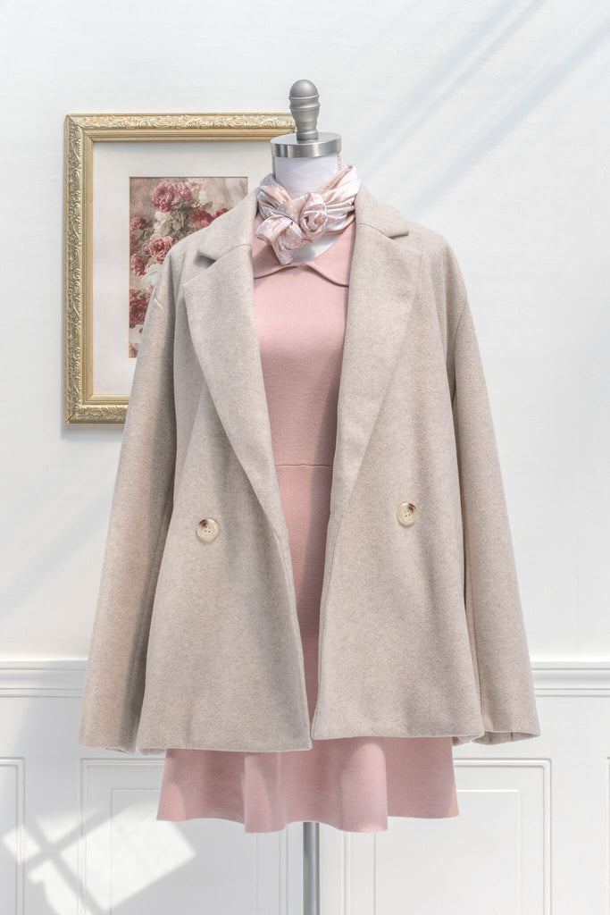 french winter coat style - a soft taupe boyfriend cut winter jacket - styled with pink dress view 