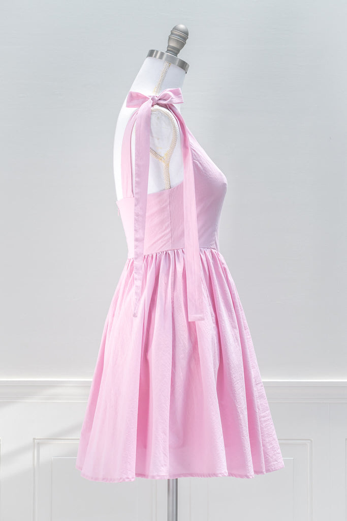 pink aesthetic dresses from amantine - a pink barbiecore mini dress, sweetheart neckline and tie shoulder straps - side view 