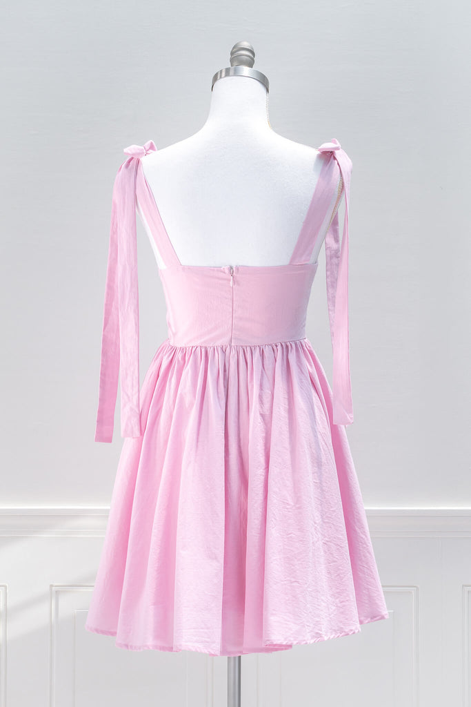 pink aesthetic dresses from amantine - a pink barbiecore mini dress, sweetheart neckline and tie shoulder straps - back view 