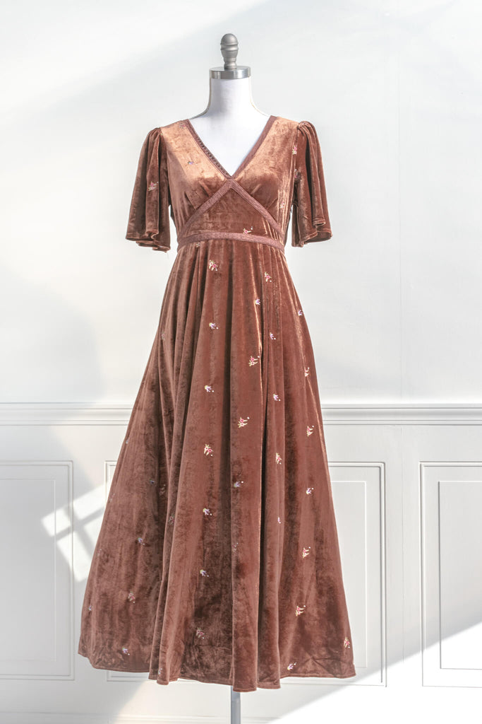 Velvet dress for holidays and festive events this winter. A beautiful V neck, 3/4 sleeve, lace trim, maxi skirt dress. Copper velvet with 1/2 inch dainty floral embroidery detail. Front view. Amantine. 
