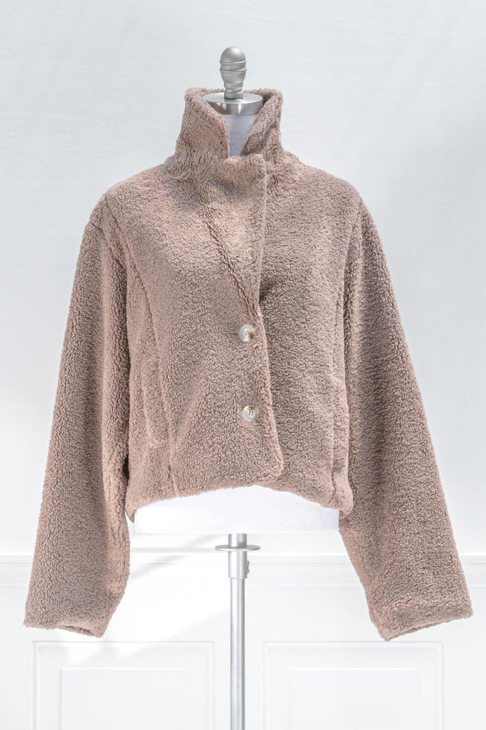 French feminine tops - a feminine winter sherpa coat in taupe - french and feminine outerwear - amantine - front view  colar up 