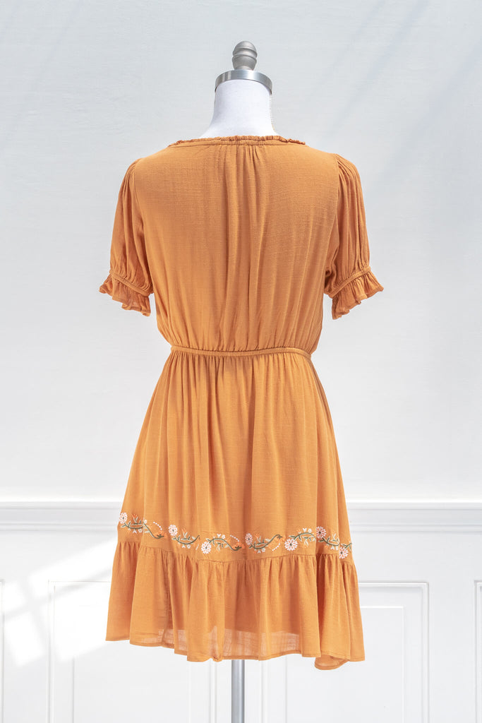 french dresses - vintage and feminine style - an autumn aesthetic orange dress with floral embroidered details - back view