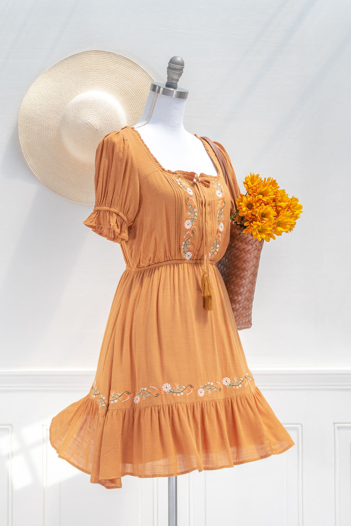 french dresses - vintage and feminine style - an autumn aesthetic orange dress with floral embroidered details - quarter view