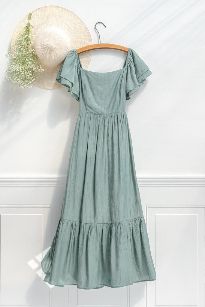 cottage core dress - a french and feminine style midi, with square neckline, and puff sleeves in green. Amantine - on hanger view