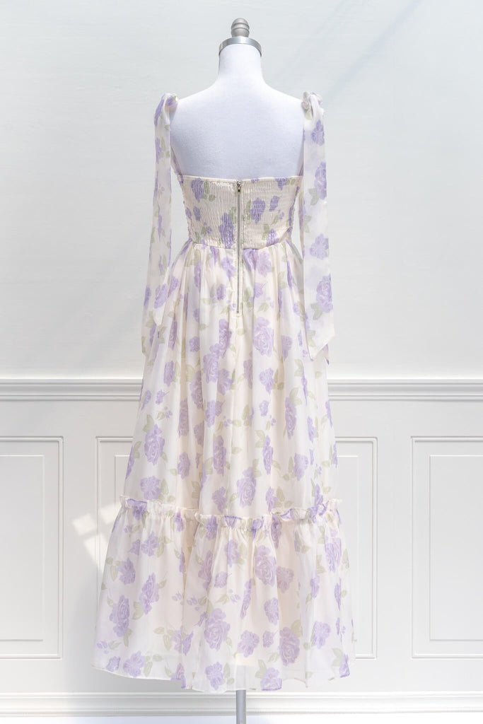 aesthetic clothes - amantine - a feminine french dress in lavender floral print with tie shoulder straps - amantine - backl view