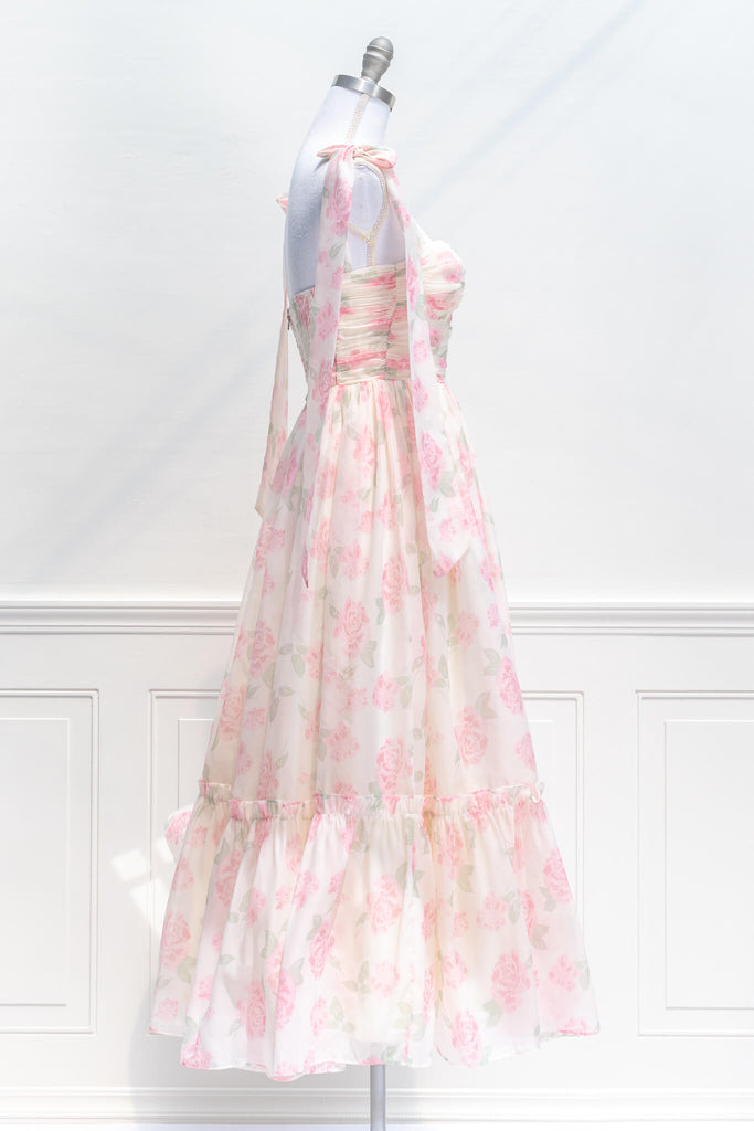 aesthetic clothes - amantine - a feminine french dress in pink floral print with tie shoulder straps - amantine - side view