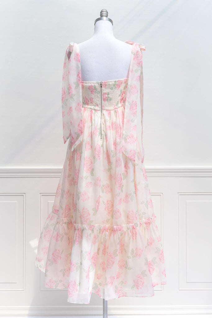 aesthetic clothes - amantine - a feminine french dress in pink floral print with tie shoulder straps - amantine - back view