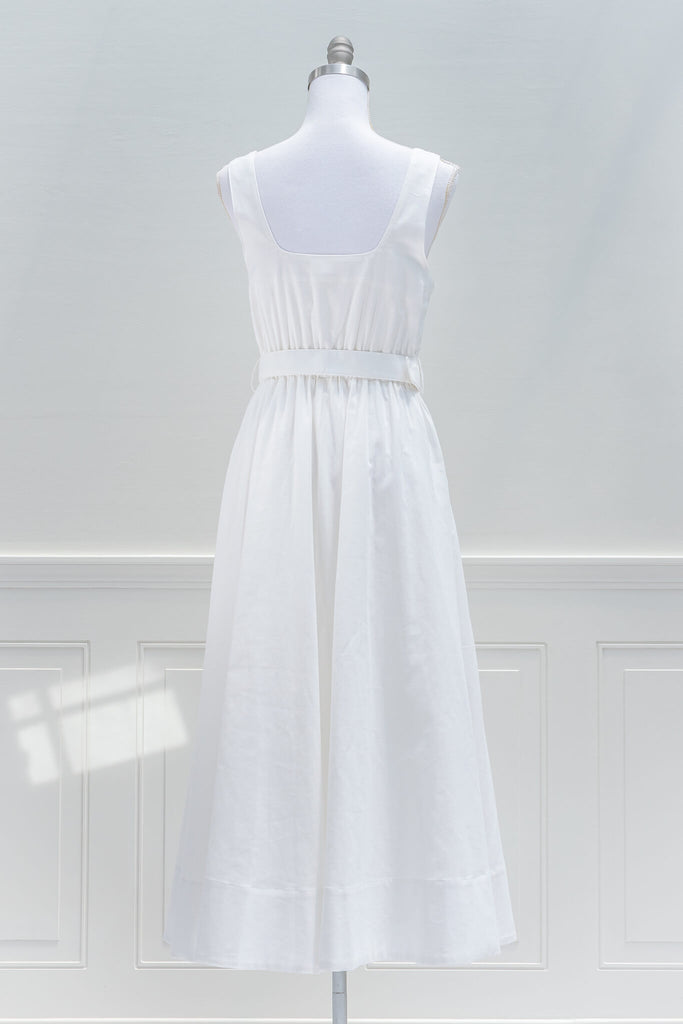 Timelessly chic for your vacation wardrobe, the Summer in Provence midi dress in a crisp white cotton-linen blend evokes the classic, vintage-inspired styles of the Riviera. Featuring a sweetheart neckline, button-front, a removable waist belt, and side-seam pockets - aesthetic clothes - amantine - back view 