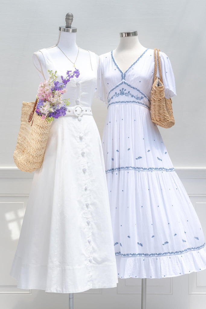 Timelessly chic for your vacation wardrobe, the Summer in Provence midi dress in a crisp white cotton-linen blend evokes the classic, vintage-inspired styles of the Riviera. Featuring a sweetheart neckline, button-front, a removable waist belt, and side-seam pockets - aesthetic clothes - amantine - front view 