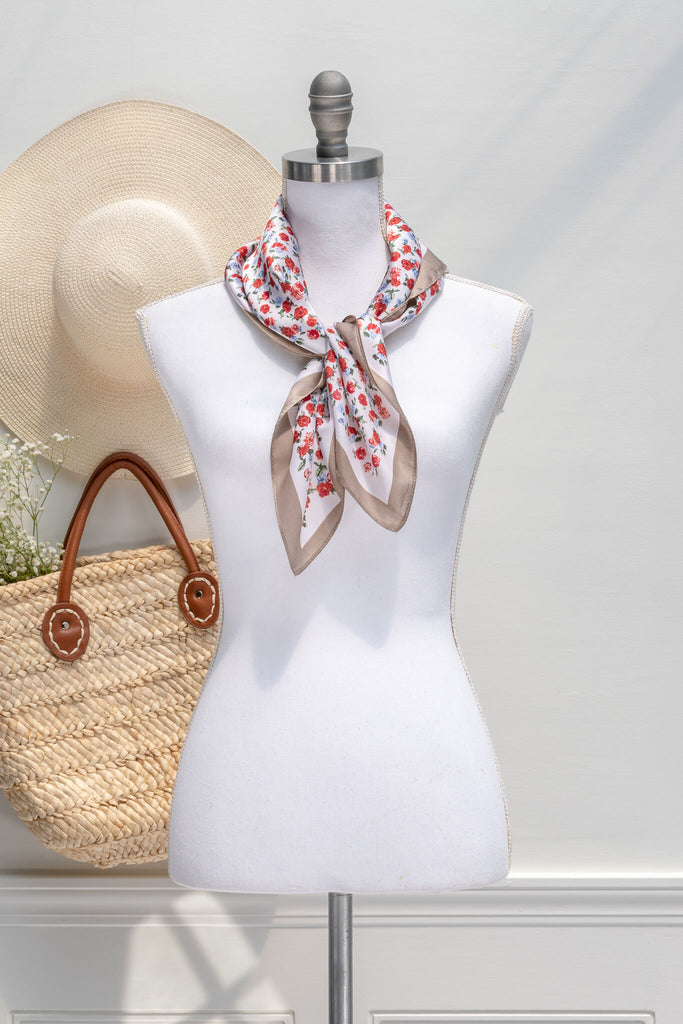 feminine, french style aesthetic  women's accessories - a red floral print on white background - feminine neck scarf  - amantine