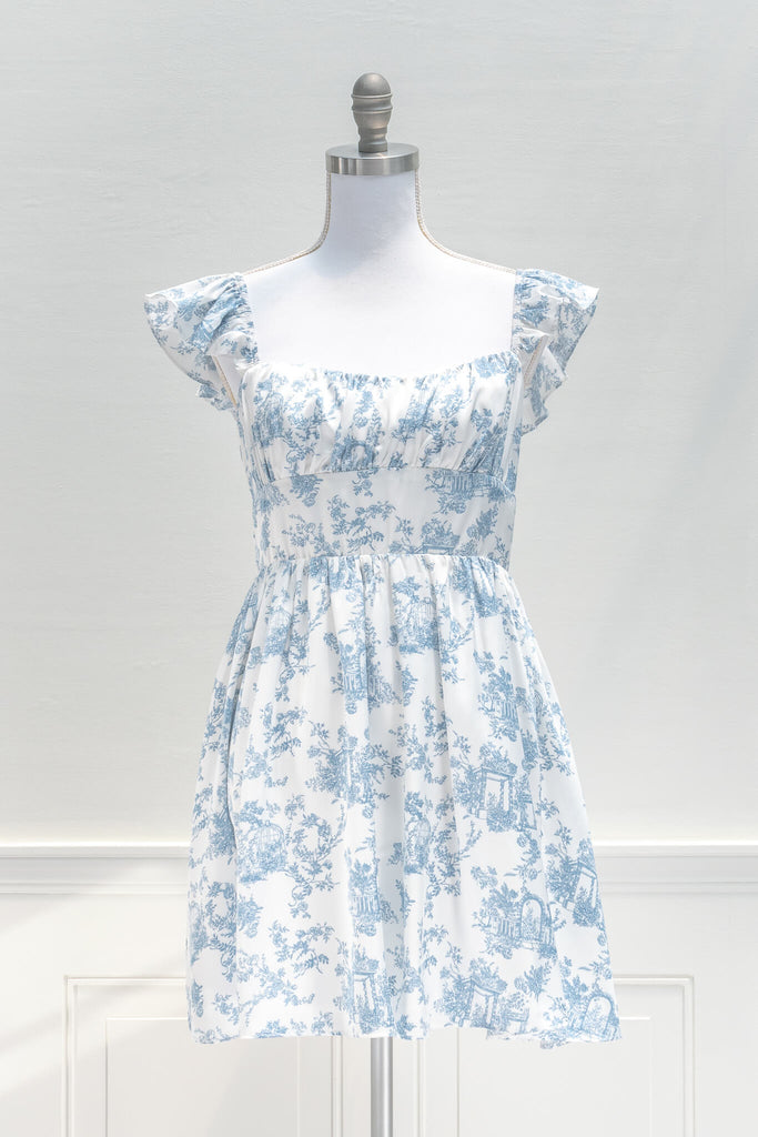 vintage style dresses inspired by french fashion - a beautiful mini dress in blue and white toile print fabric - summer dress - amantine - front view 