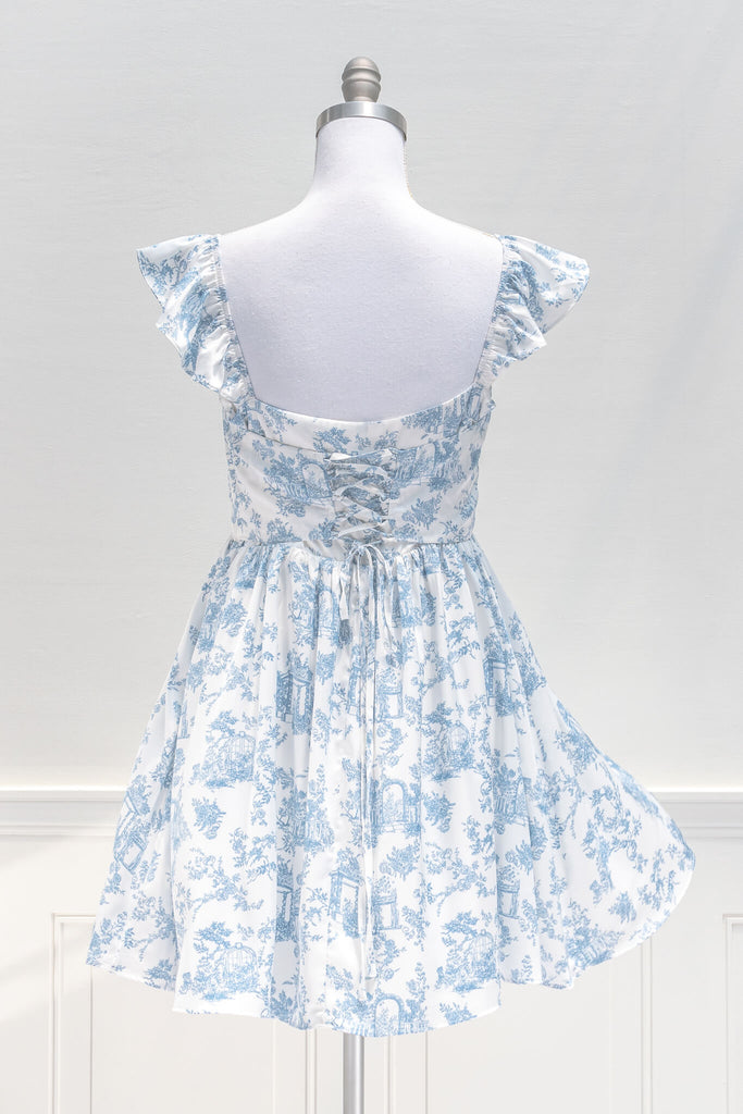 vintage style dresses inspired by french fashion - a beautiful mini dress in blue and white toile print fabric - summer dress - amantine - back view 