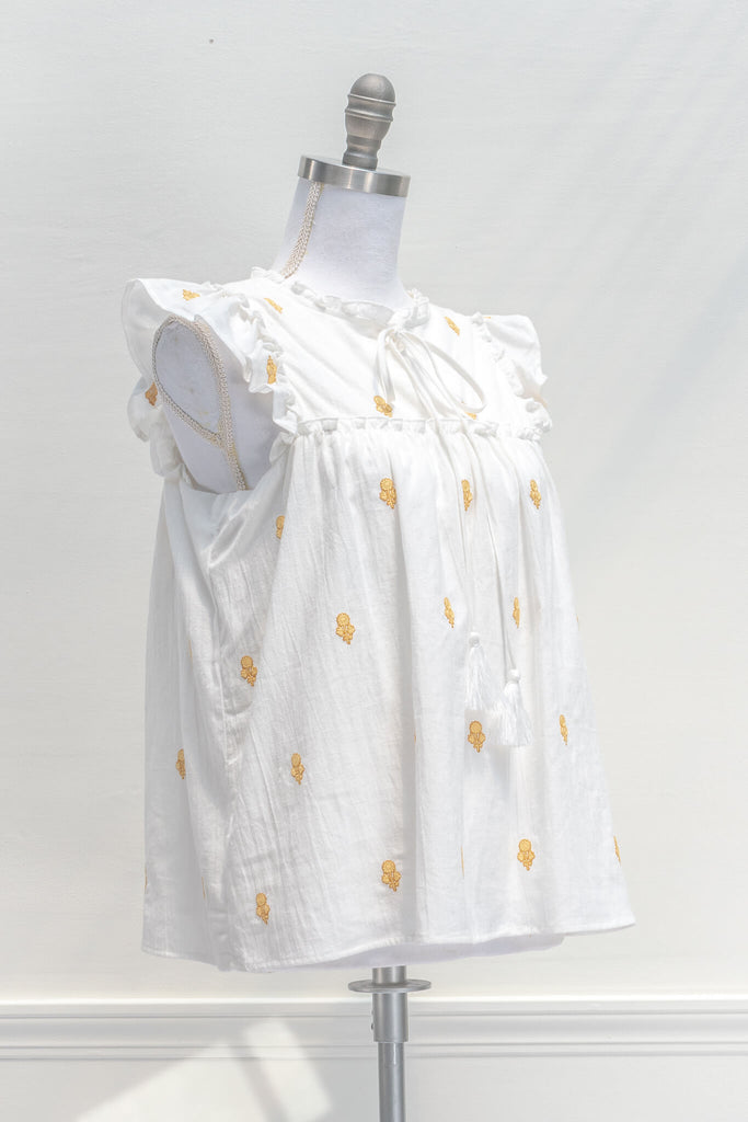 aesthetic clothes - a beautiful versatile ruffle shoulder and dainty print cotton top in white - vintage style - amantine - quarter view