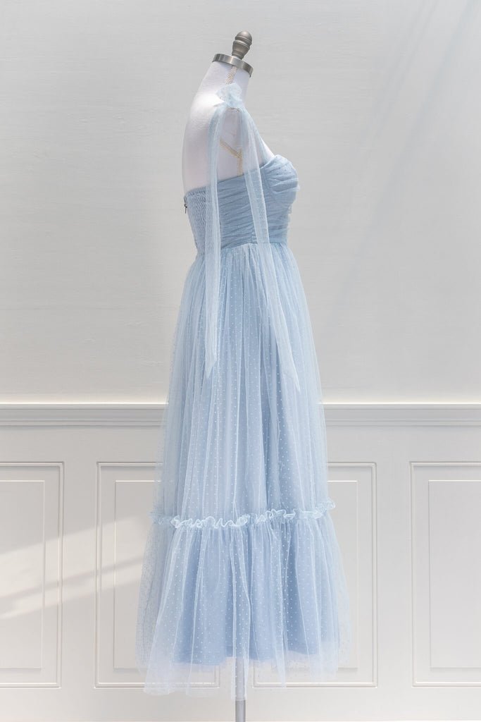 French Dress and Feminine aesthetic - a lovely dress in blue swiss dot tulle featuring dramatic tie-shoulder, center-back zipper, a ruched bustier-style sweetheart bodice. Amantine- side view