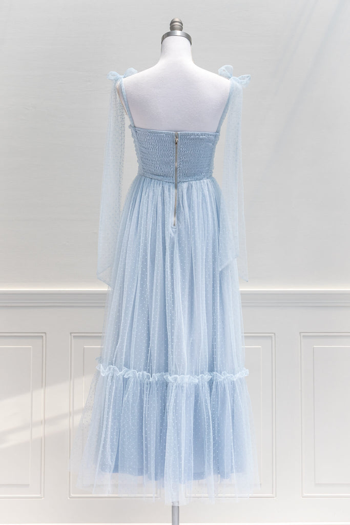 French Dress and Feminine aesthetic - a lovely dress in blue swiss dot tulle featuring dramatic tie-shoulder, center-back zipper, a ruched bustier-style sweetheart bodice. Amantine- back view