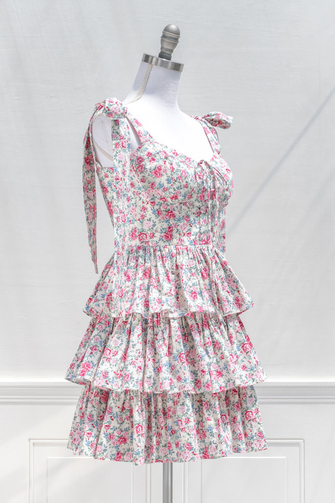 aesthetic clothes and feminine dresses from amantine - a tiered skirt, sweetheart neckline, mini pink floral dress for summer - quarter view