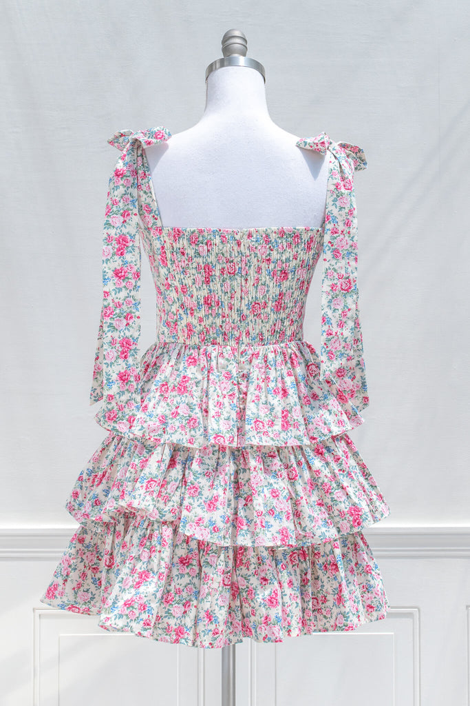 aesthetic clothes and feminine dresses from amantine - a tiered skirt, sweetheart neckline, mini pink floral dress for summer - back view