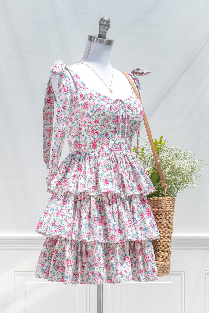 aesthetic clothes and feminine dresses from amantine - a tiered skirt, sweetheart neckline, mini pink floral dress for summer - styled with a french tote view