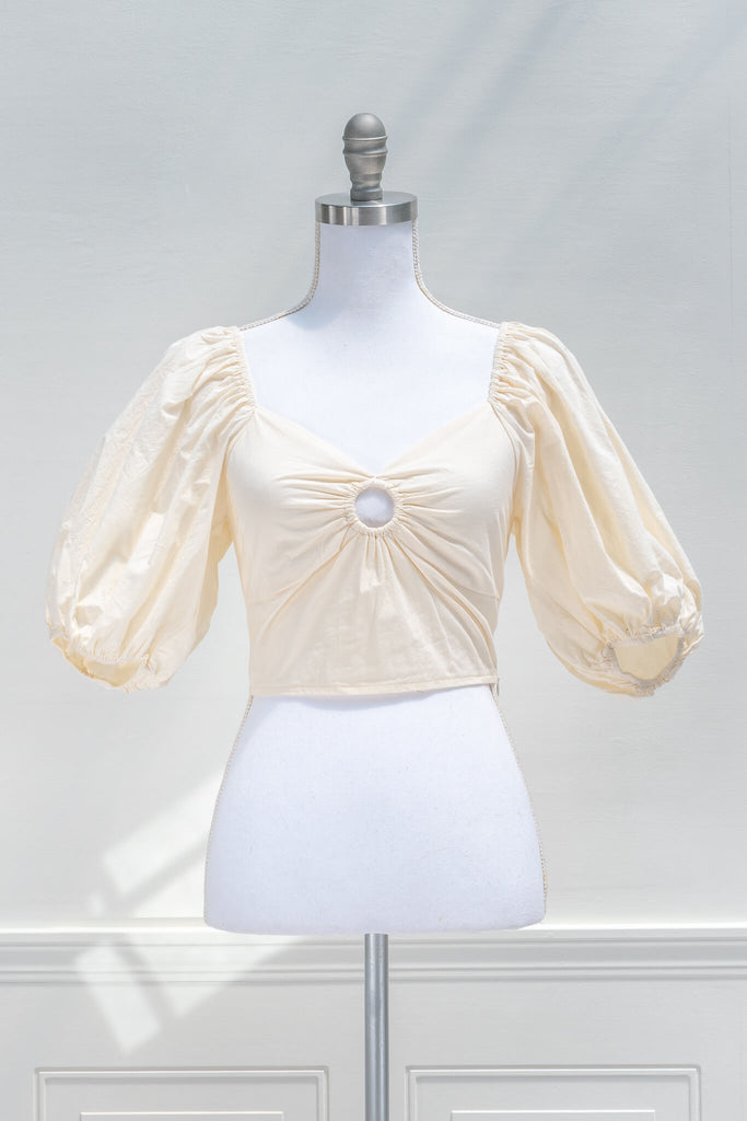 aesthetic clothes - amantine - a feminine puff sleeve romantic cropped top in cream color - front view