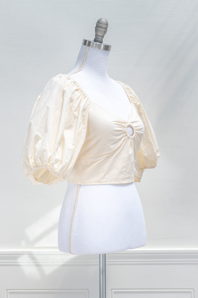 aesthetic clothes - amantine - a feminine puff sleeve romantic cropped top in cream color - quarter view
