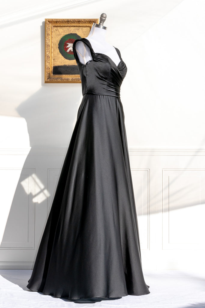 long black formal gown with structured bodice and wide skirt. a line. off the shoulder. feminine french style. 