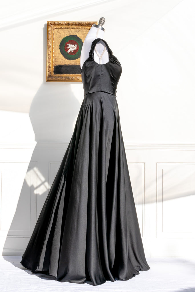 long black formal gown with structured bodice and wide skirt. a line. off the shoulder. feminine french style. 