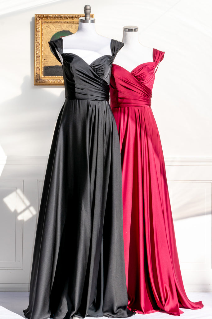 long red formal gown with structured bodice and wide skirt. a line. off the shoulder. feminine french style. 