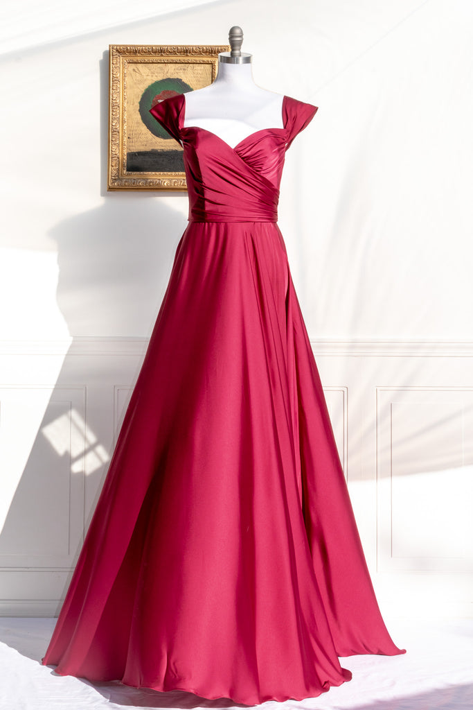 long red formal gown with structured bodice and wide skirt. a line. off the shoulder. feminine french style. 