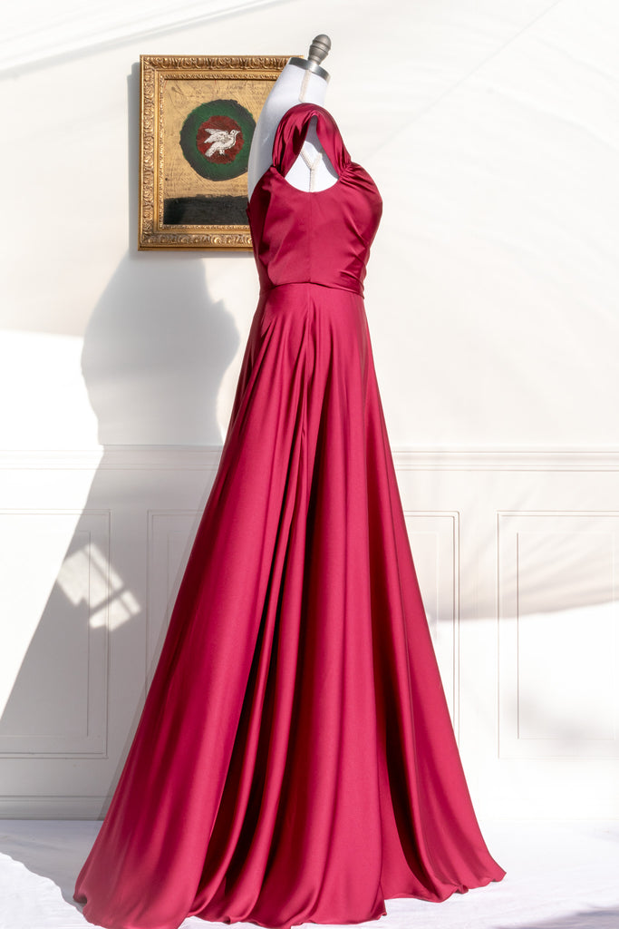 long red formal gown with structured bodice and wide skirt. a line. off the shoulder. feminine french style. 