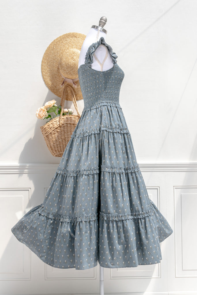 Camille floral smocked dress — side view with fitted bodice and flowing tiered skirt