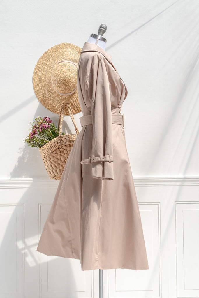 Charlotte fit-and-flare trench — side view with nipped waist and sweeping pleated skirt