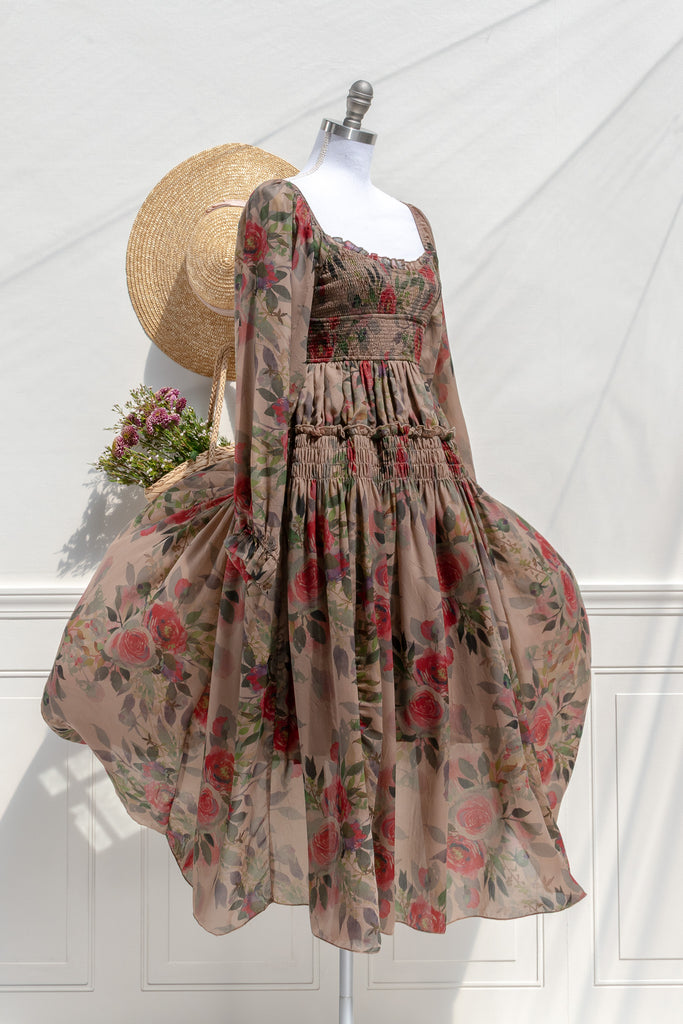 Hazel rose chiffon smocked midi dress — three-quarter view showing waist smocking and flowing skirt
