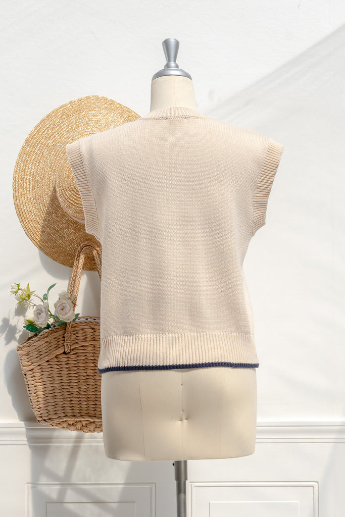 Homestead cream sweater vest—back view with clean knit and rib trim