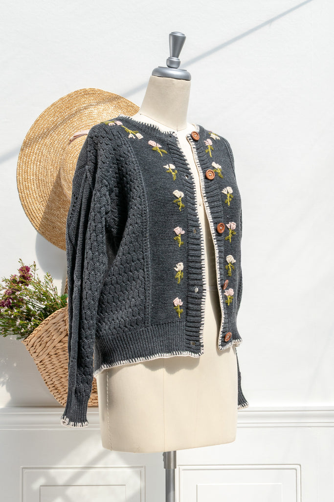 Matilda charcoal cardigan — 3/4 view showing floral embroidery and wooden-style buttons