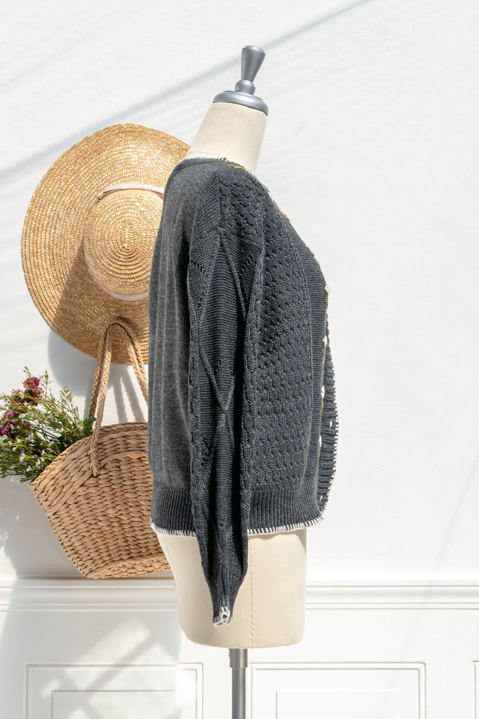 Matilda embroidered cardigan — side view with cable-knit sleeve and contrast edge