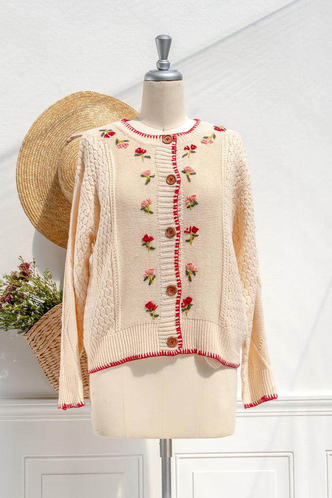 Amantine Matilda floral-embroidered cardigan in cream with red contrast trim and button front — front view